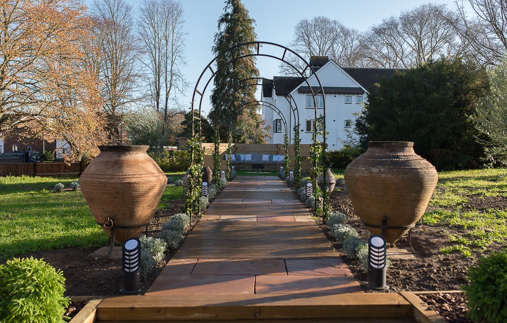 Chantry House outdoor venue with lush greenery, perfect for weddings and garden parties.
