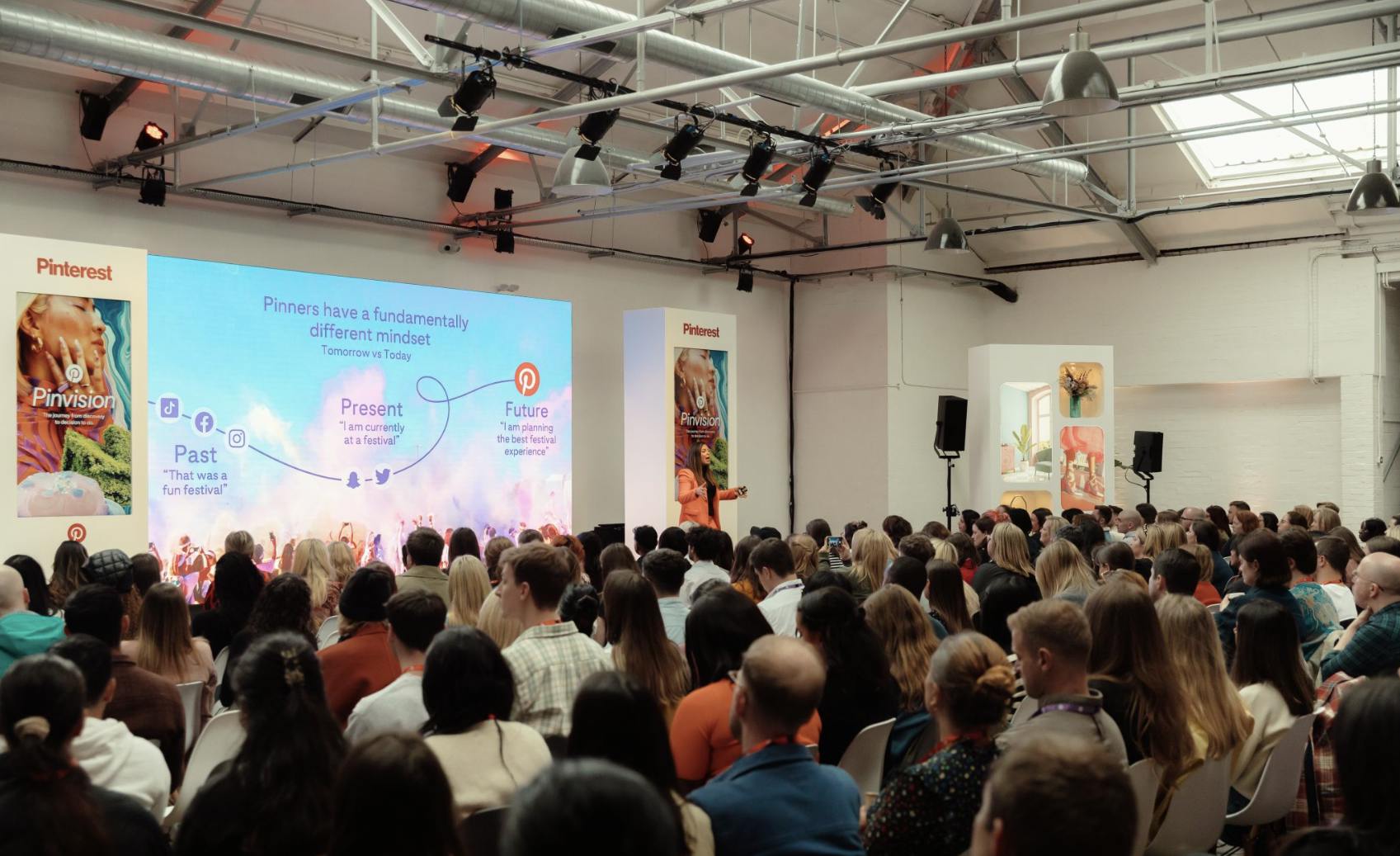 Engaging speaker at a well-attended conference in modern Protein Studios.