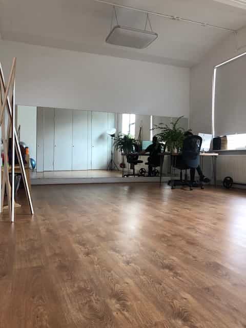 Versatile meeting space at Marcophysio Westferry, ideal for workshops and collaboration.