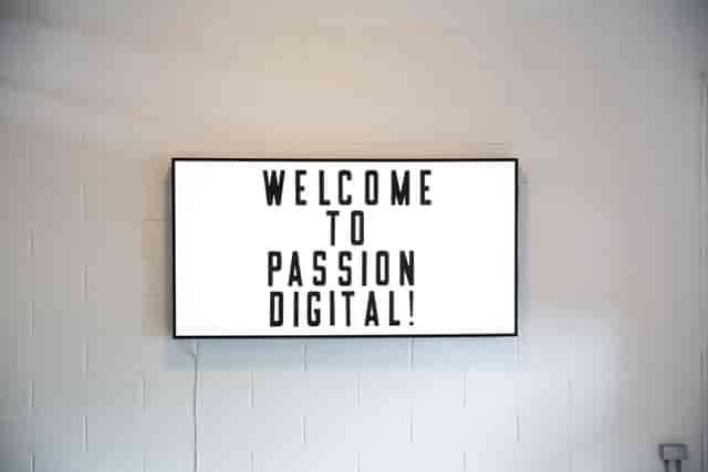 Sleek digital display at Whole Mezzanine, Union Court for a professional event welcome.