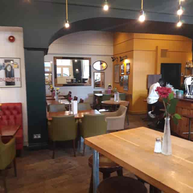 Auberge Waterloo cozy restaurant interior for networking events and team lunches.