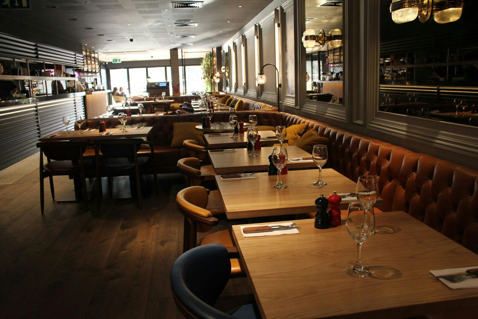 Stylish restaurant in Hache Kingston with warm lighting for intimate events and meetings.