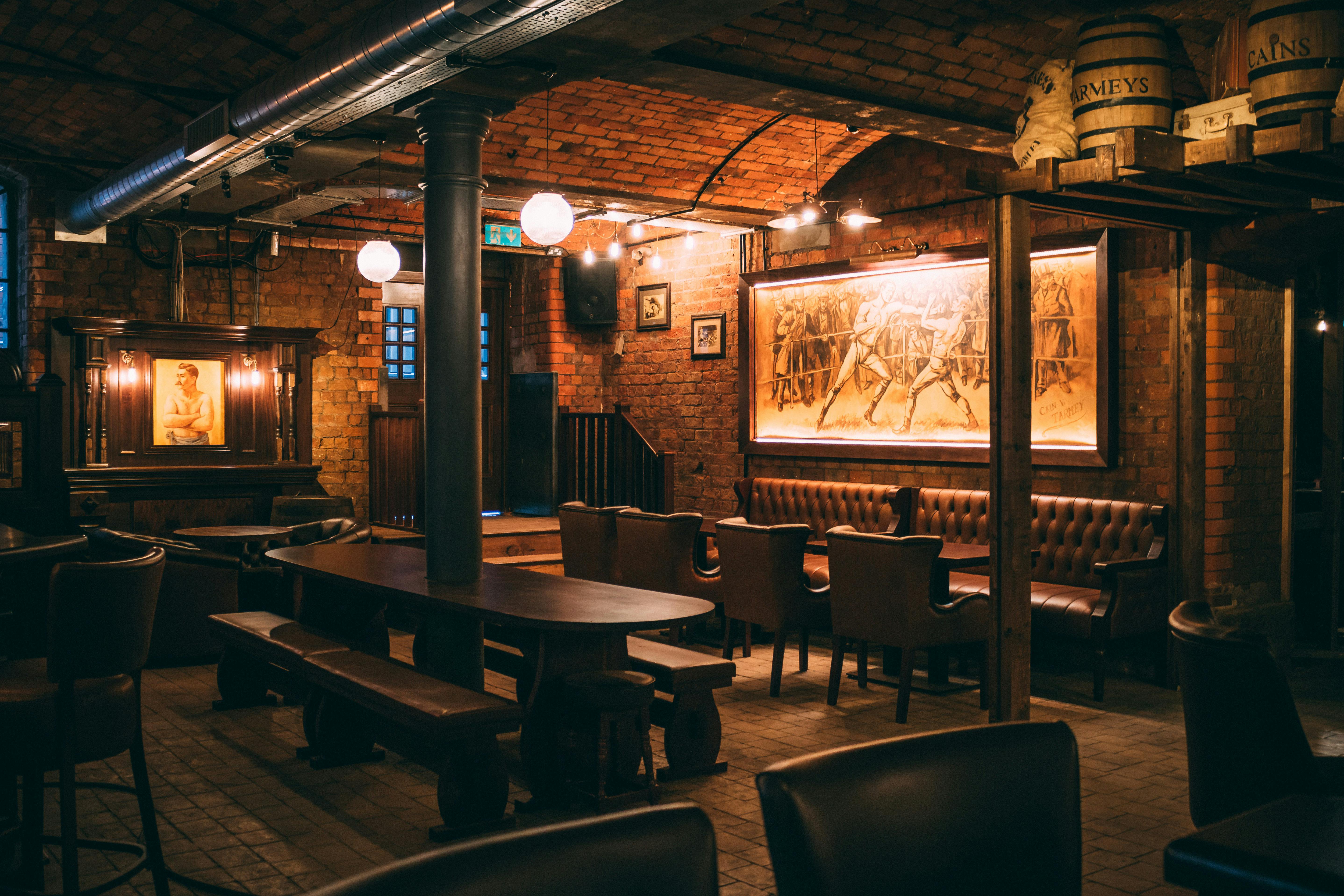 Stylish rustic venue Snug in Punch Tarmey's Liverpool for intimate gatherings and events.