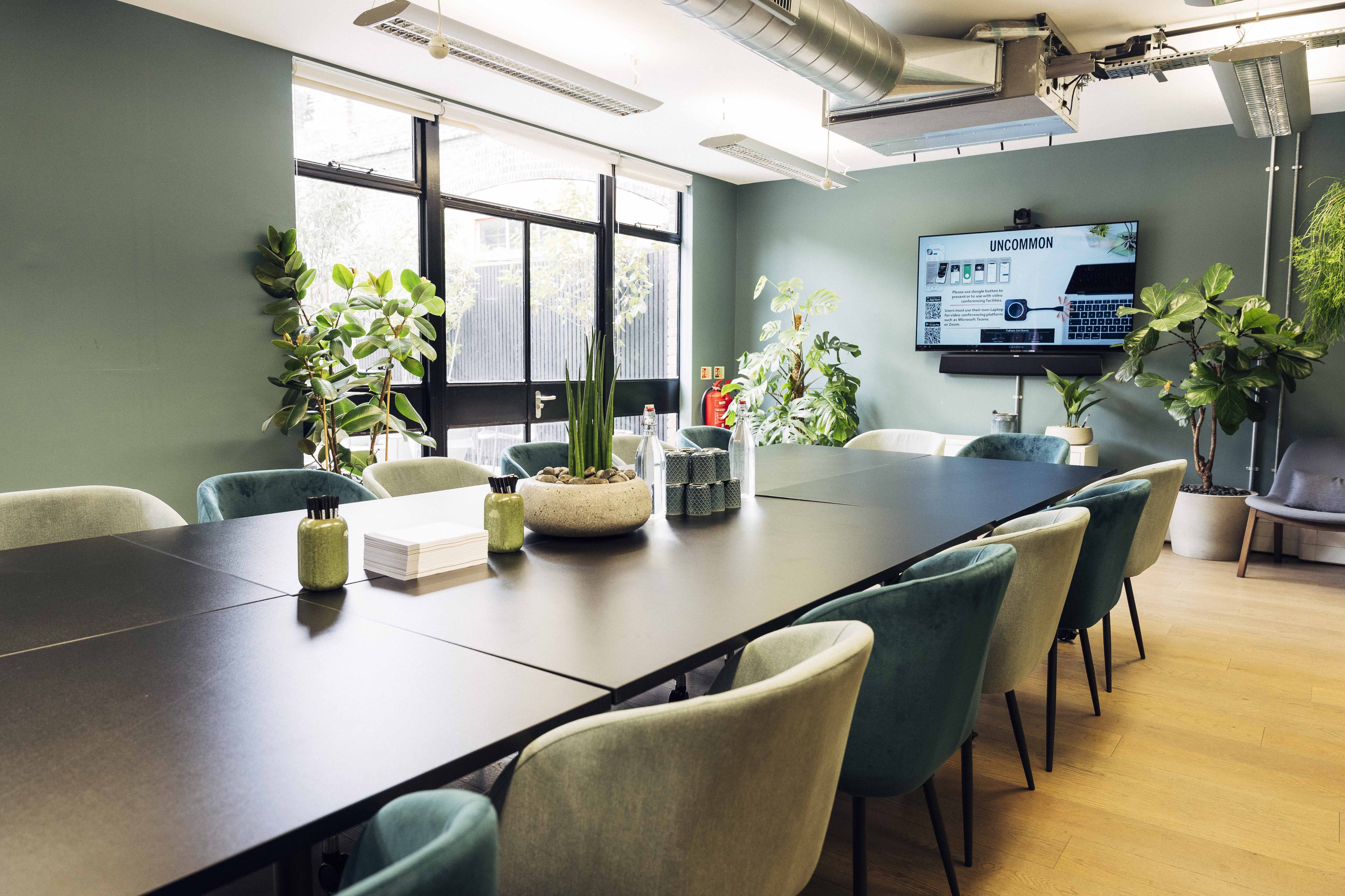 Modern meeting room in Zen Studio, perfect for creative team events and presentations.