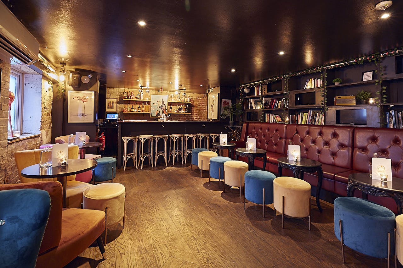 Stylish venue with colorful seating for intimate meetings and social events in Shoreditch.