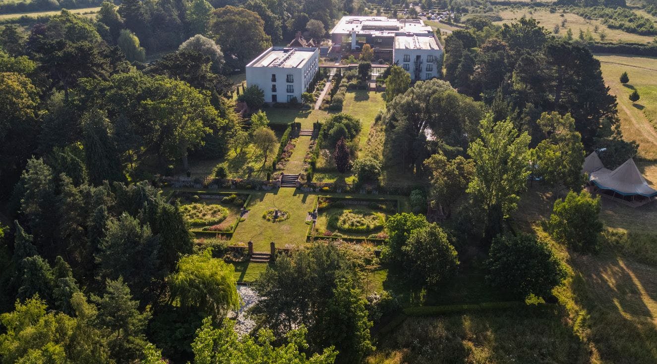 Gardens at Lifehouse Spa, ideal for outdoor events with lush landscaping and versatile space.