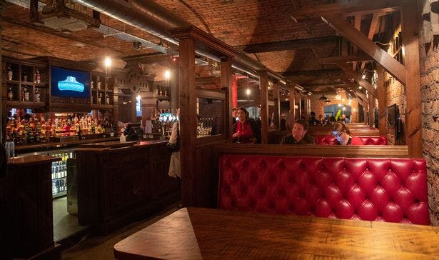 Brewery Hall in Punch Tarmey's Liverpool, rustic venue for events with exposed brick walls.