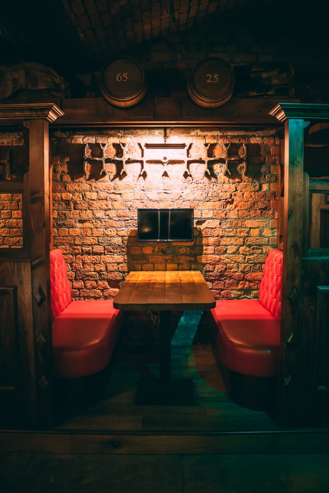 Cozy Brewery Hall with rustic brick wall, ideal for meetings and brainstorming in Liverpool.
