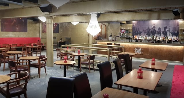Upstairs bar in Peaky Blinders Liverpool, rustic ambiance for events and gatherings.