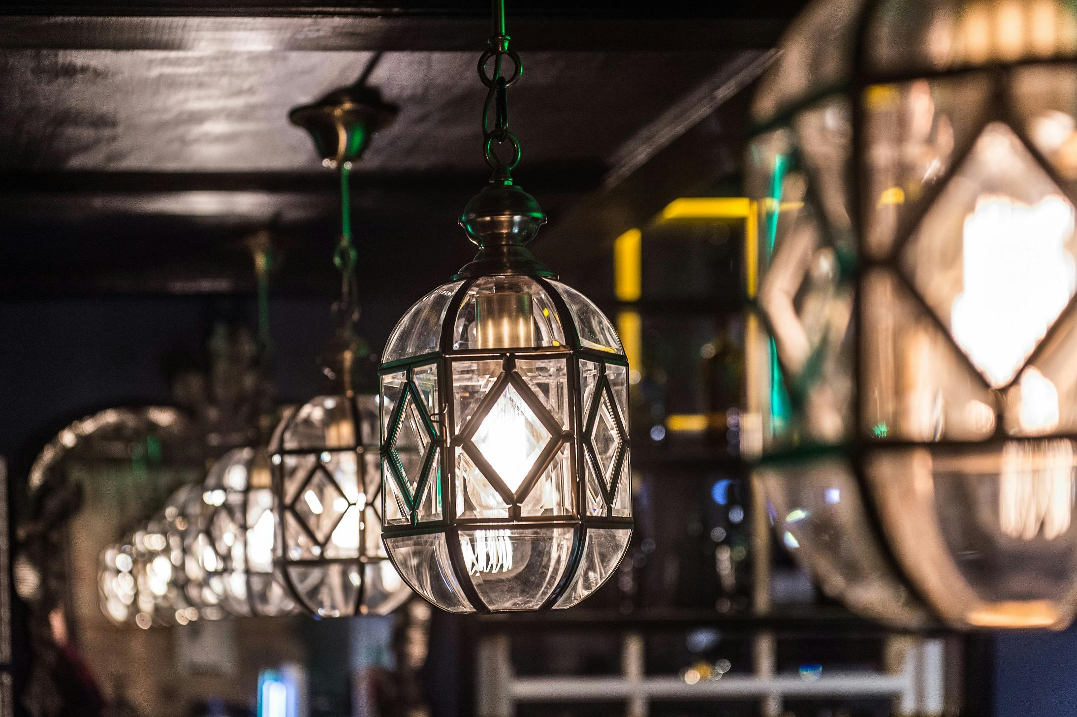 Elegant pendant lighting at Curious Tavern, perfect for upscale events and gatherings.