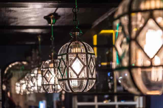 Elegant pendant lighting at Curious Tavern, perfect for upscale events and gatherings.