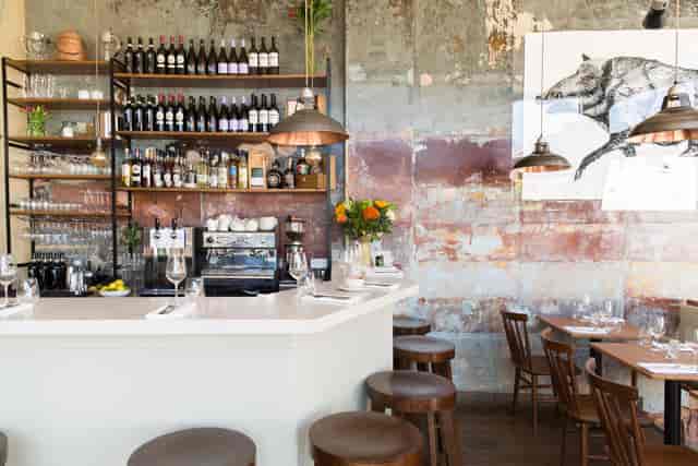 Private dining wine cellar in Maremma with rustic decor, ideal for corporate events.