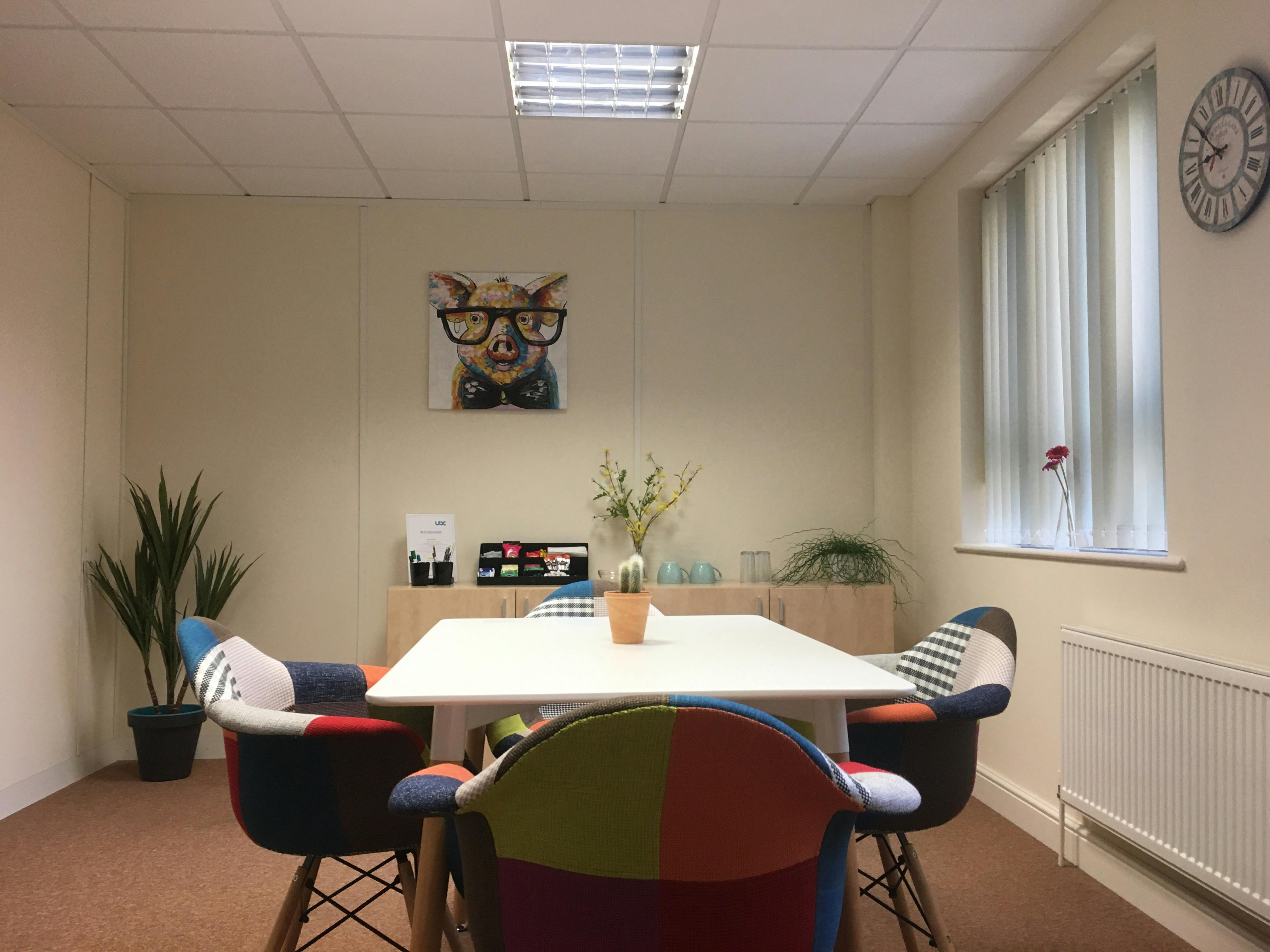 Bright meeting room at The Cow Shed, UBC Cirencester, perfect for team brainstorming sessions.