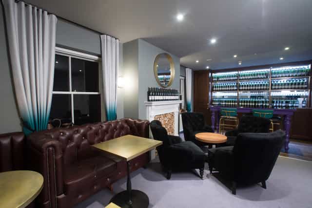 Stylish lounge with plush seating for networking events at SMWS 19 Greville Street.