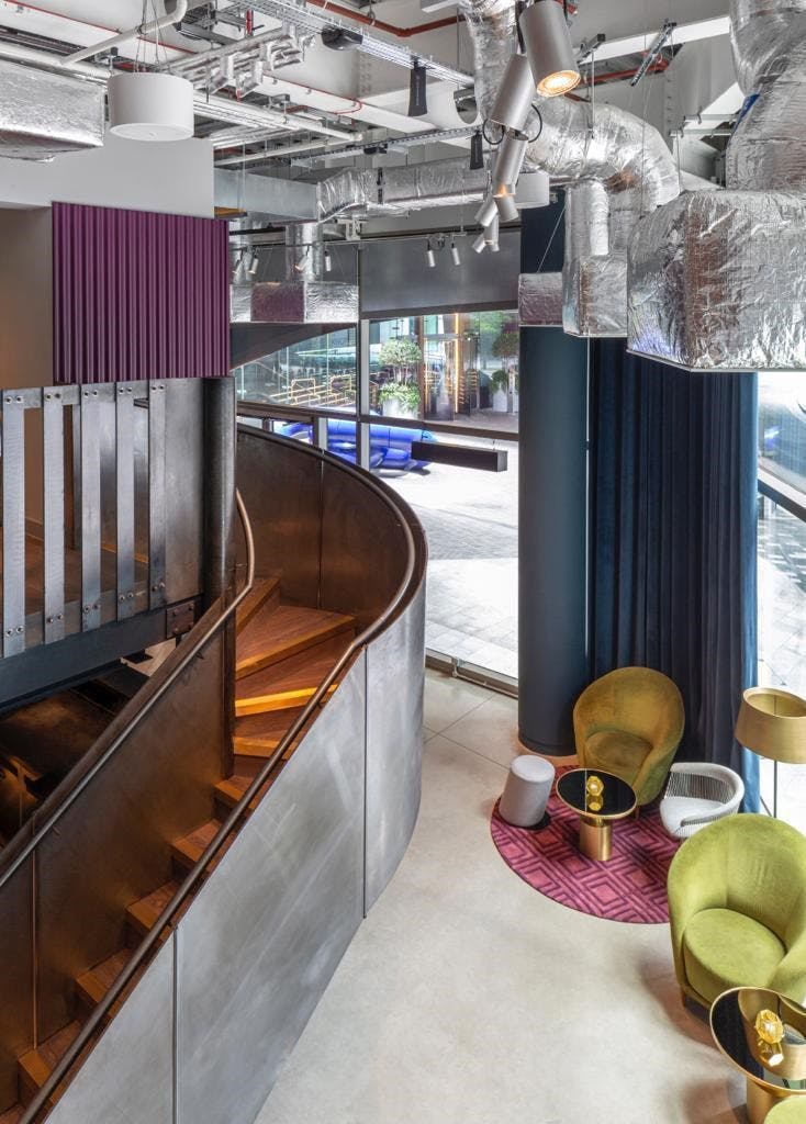 Modern venue at Sea Containers Hotel London with sleek staircase, ideal for events.