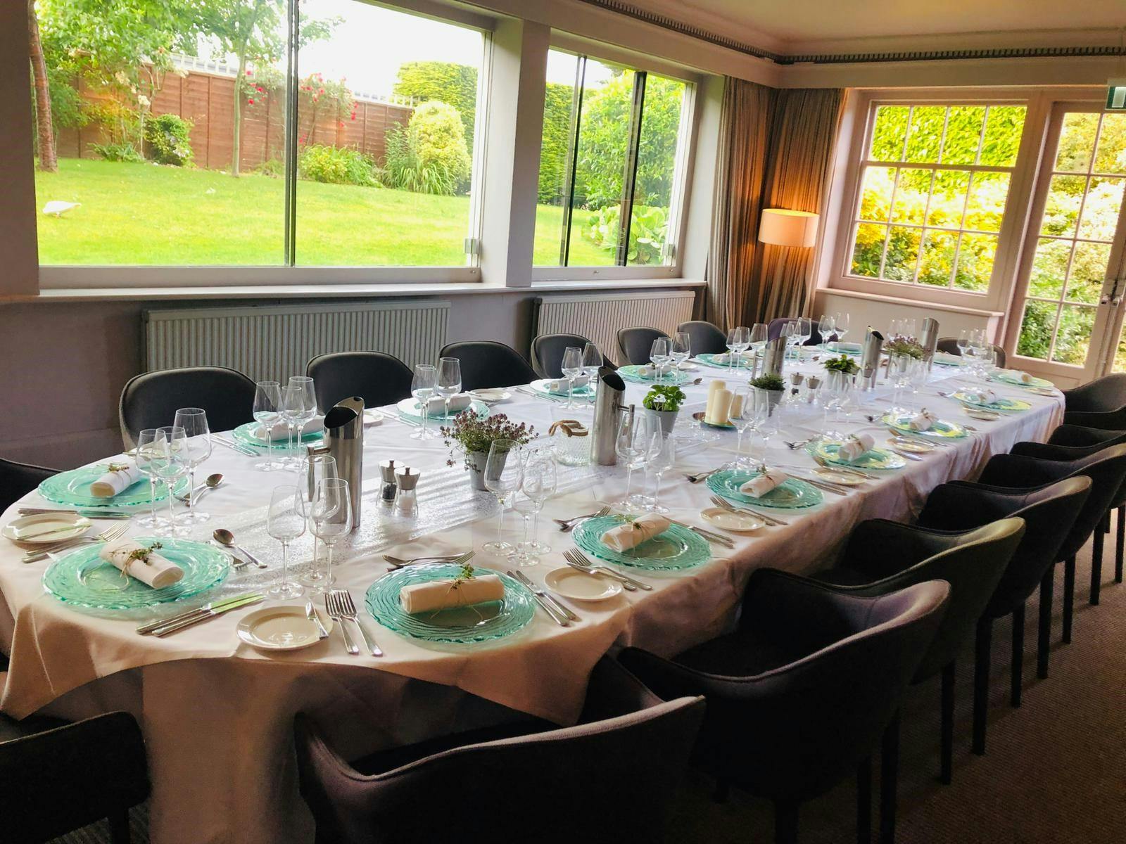 Elegant dining table at The Elms Hotel for corporate dinners and special events.