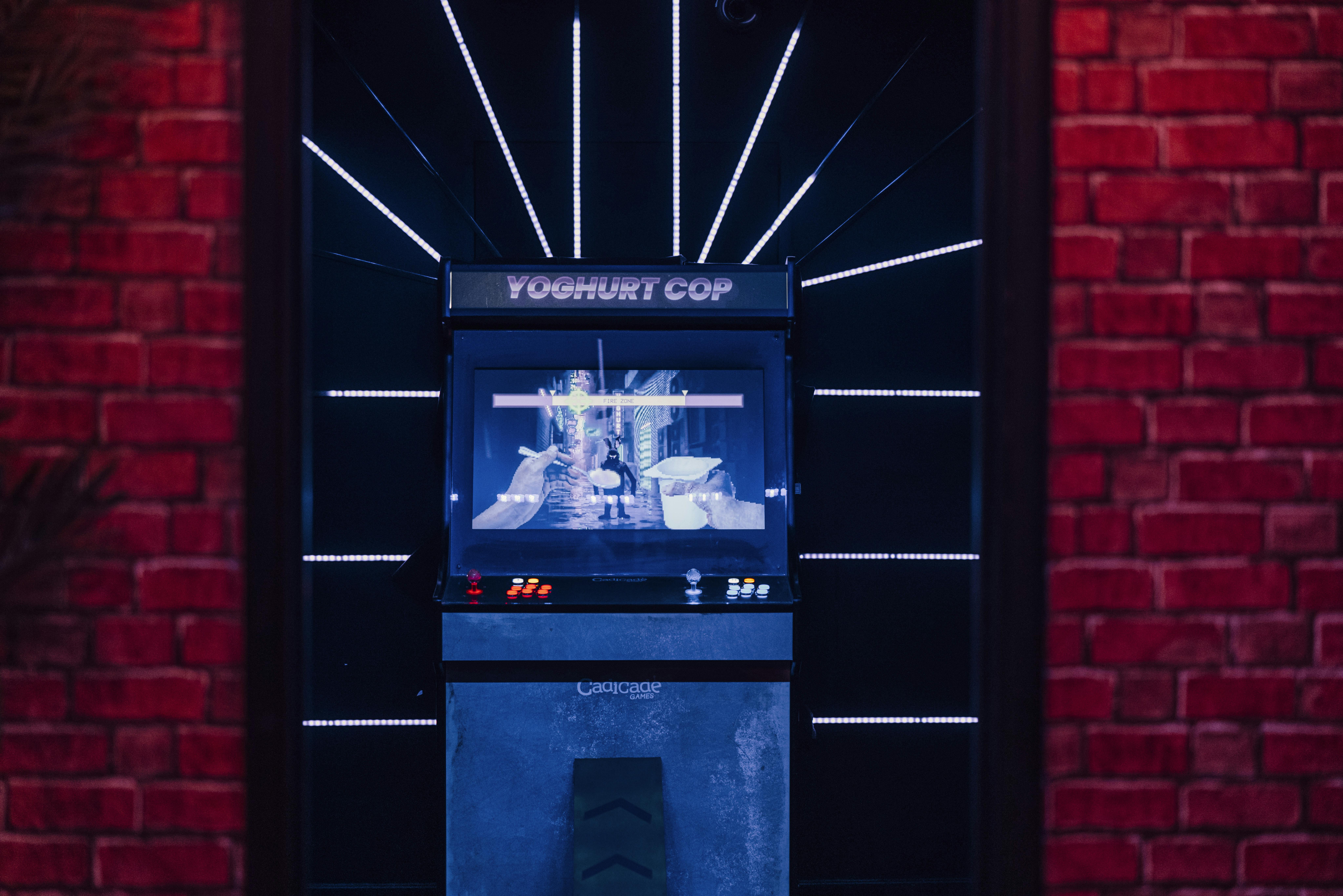 Retro arcade game "Yogurt Cop" at Caddies Southend for engaging event entertainment.