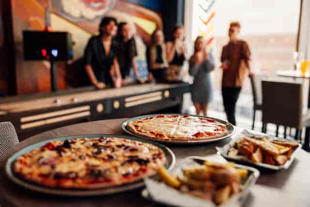 Vibrant event space at Caddies Southend for casual dining and networking.