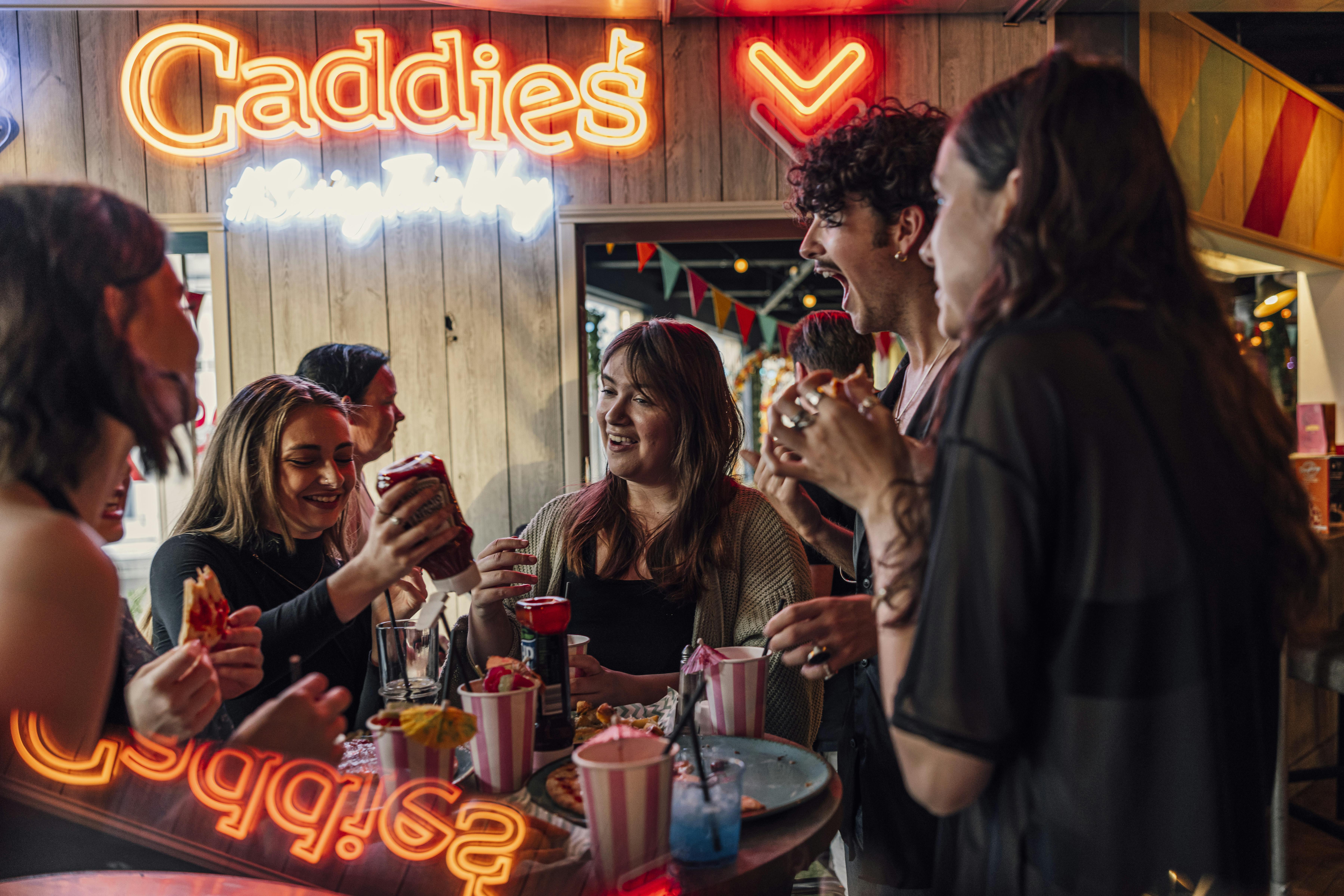 Vibrant casual event space at Caddies Southend for networking and team-building.