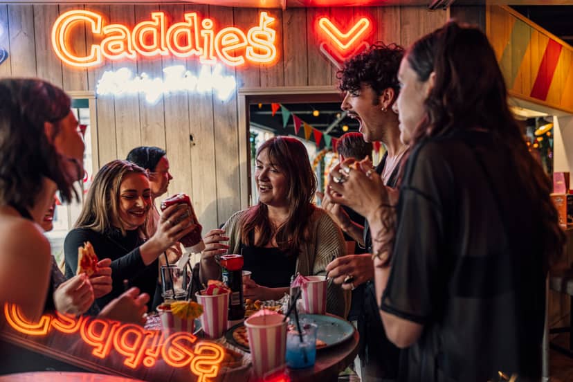 Vibrant casual event space at Caddies Southend for networking and team-building.