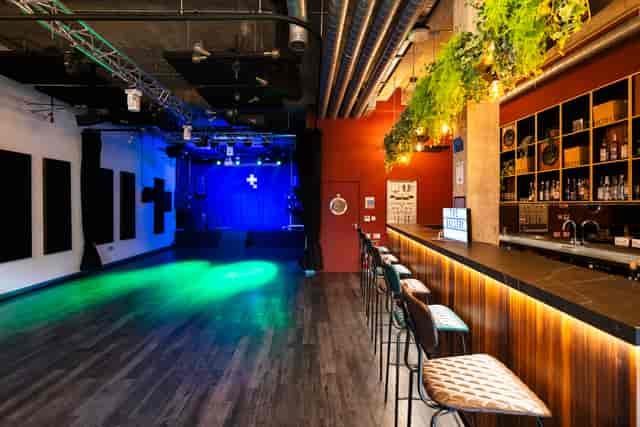 Versatile event space in The Gallery, Tileyard London, ideal for corporate and social gatherings.