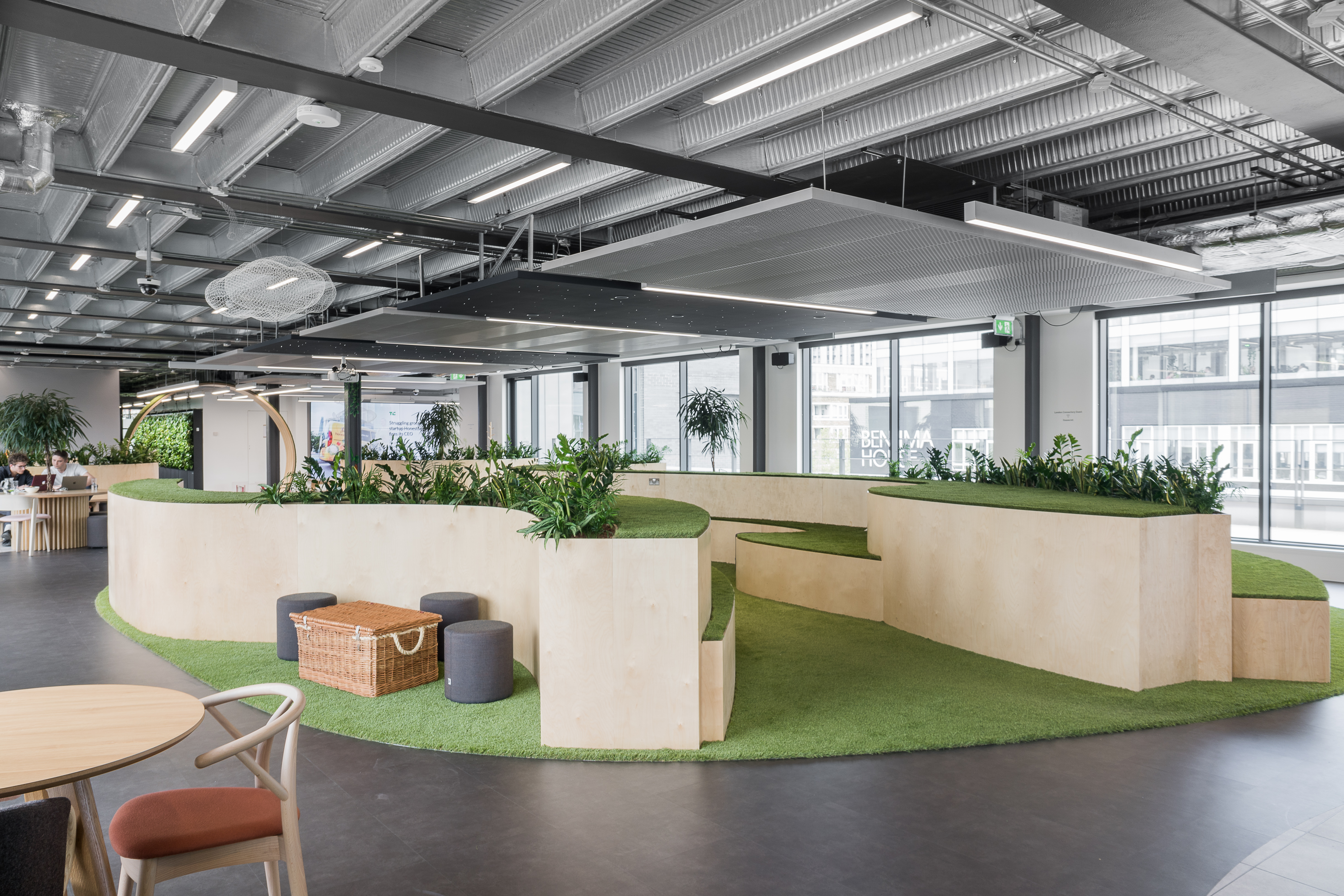 Modern flexible meeting space with greenery, ideal for workshops and gatherings in London. - Banner