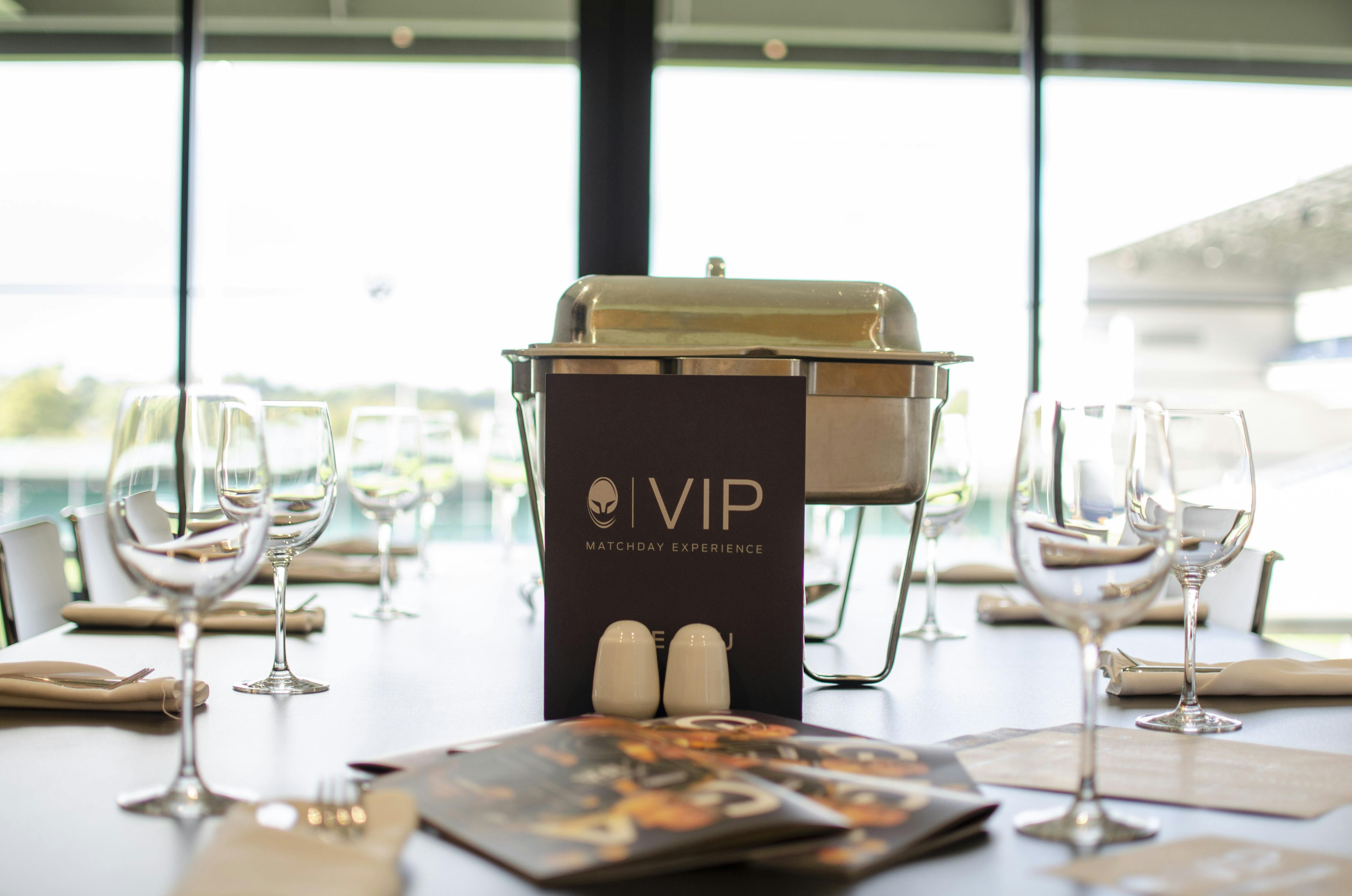 Elegant dining setup at Sixways Stadium for a VIP event with stylish glassware.