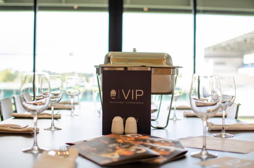 Elegant dining setup at Sixways Stadium for a VIP event with stylish glassware.