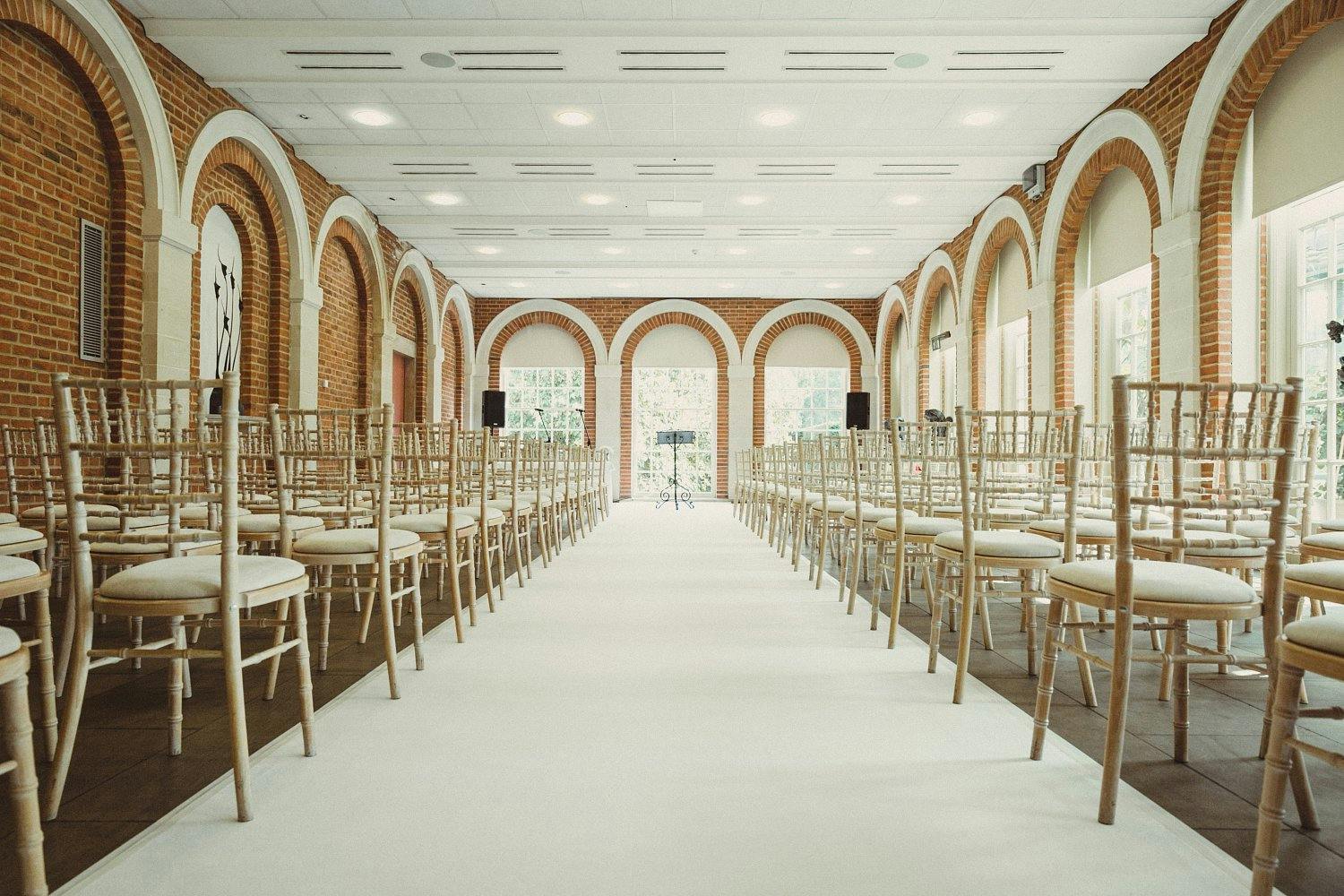 Orangery and Conservatory at Great Fosters, elegant chiavari chairs for weddings and events.