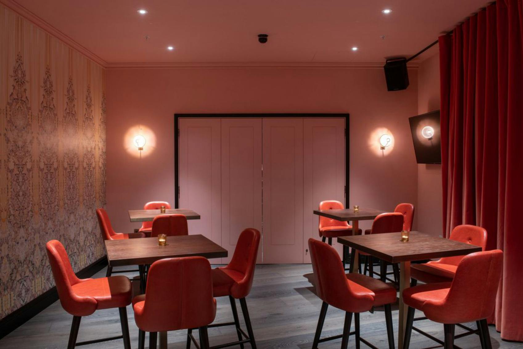 Stylish Rose Private Room at Puttshack Bank, perfect for intimate events and gatherings.