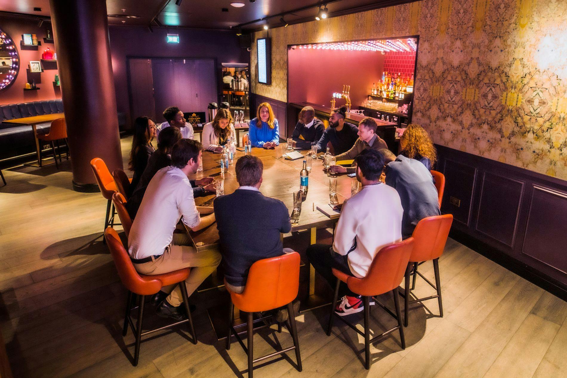 Ruby Private Room at Puttshack Bank, round table setup for meetings and brainstorming.