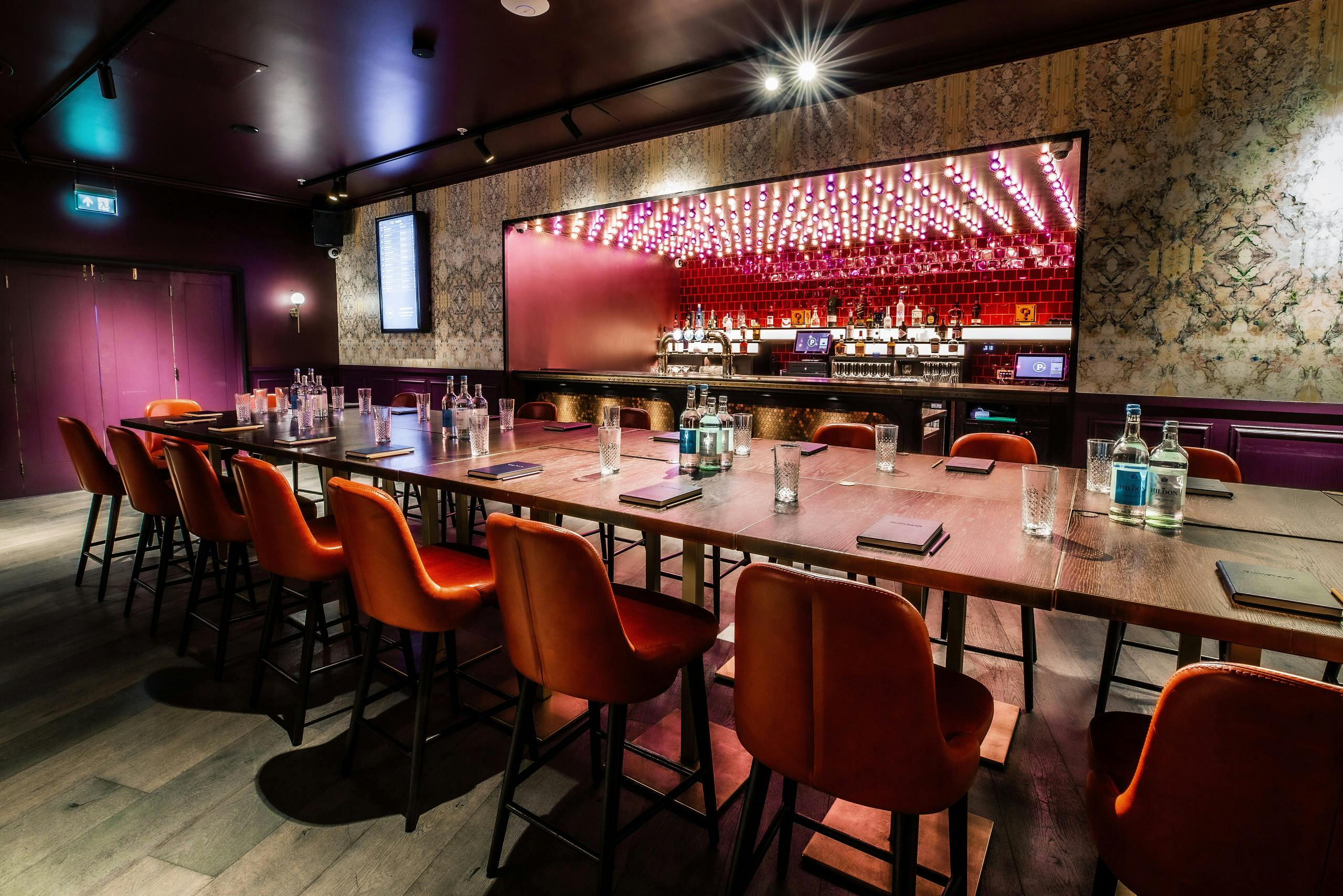 Stylish Ruby Private Room at Puttshack Bank for intimate meetings and events.
