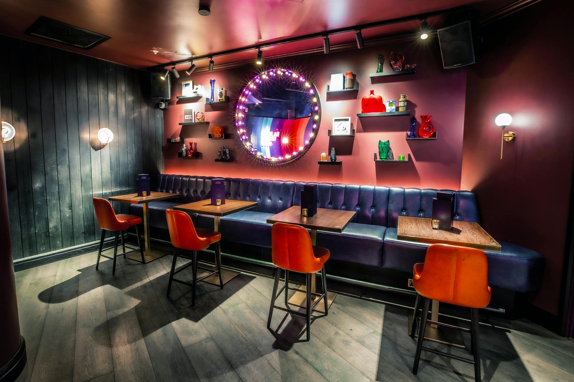 Stylish Ruby Private Room at Puttshack Bank for intimate meetings and networking events.