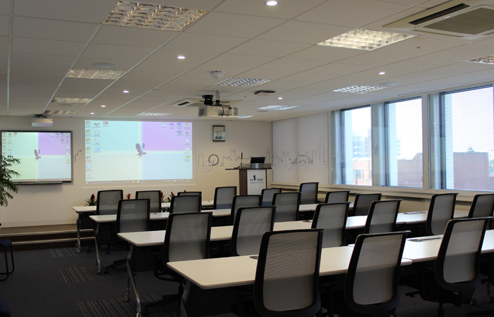 Well-equipped conference room in Hawk Training, perfect for seminars and meetings. - Banner