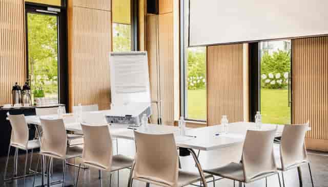 Modern meeting room in Timber Lodge, ideal for collaborative events and presentations.