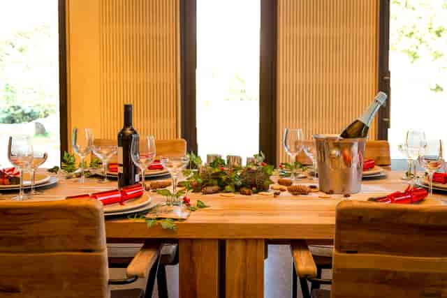 Elegant dining table setup for corporate events in Timber Lodge.