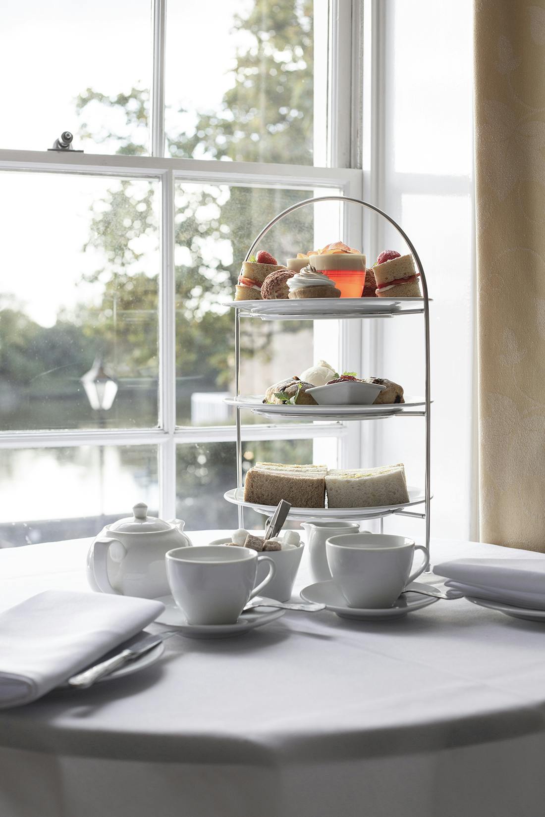 Elegant afternoon tea setup in Commodores Room, perfect for networking events.