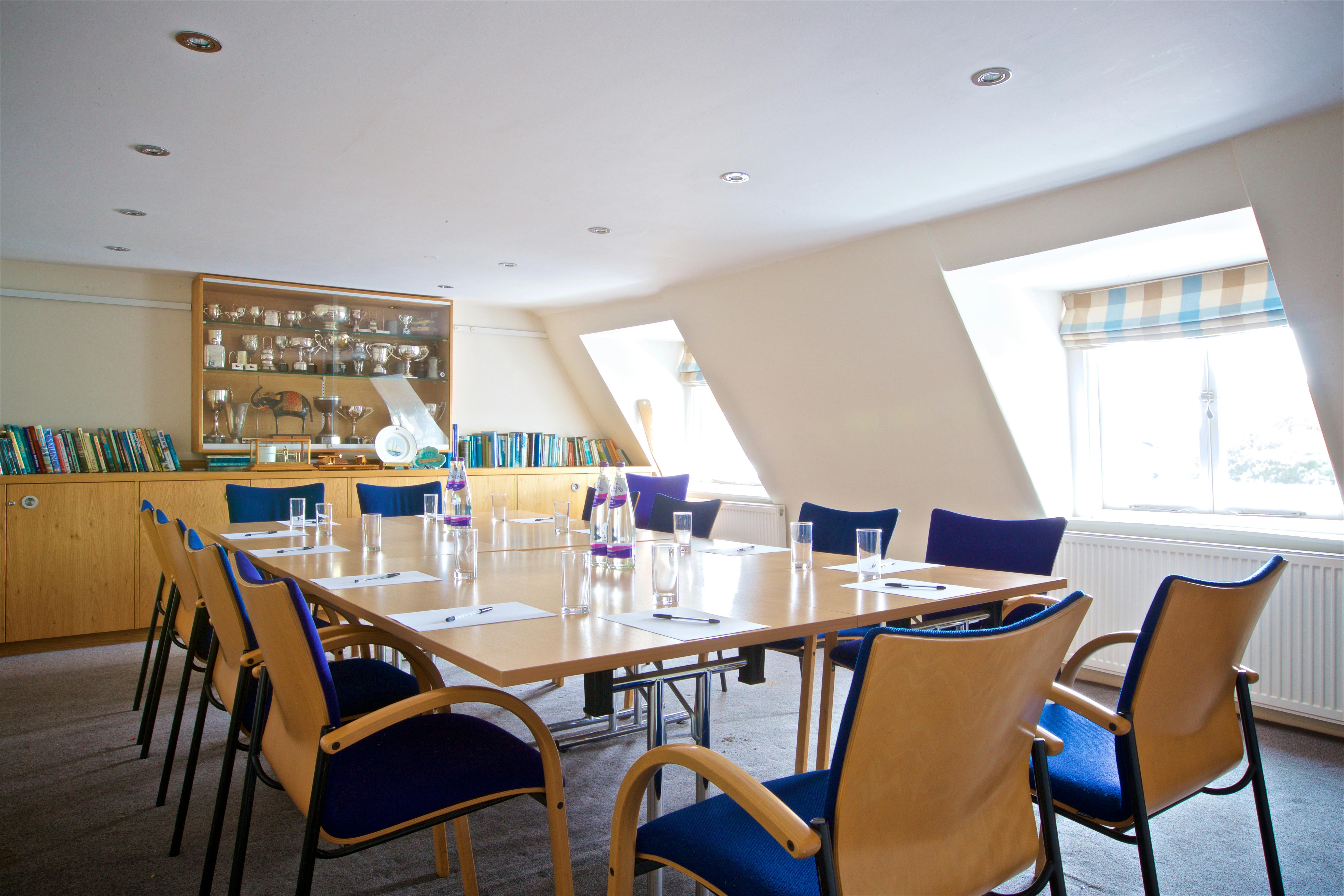 Boardroom in Linden House with large table, ideal for meetings and brainstorming sessions.