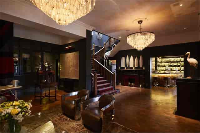 Elegant venue with chandeliers for meetings and events at Glazebrook House.