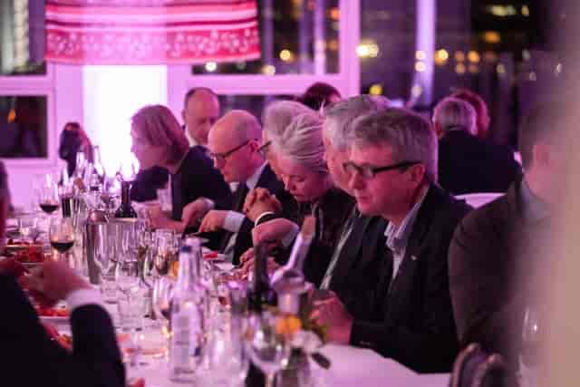 Elegant dinner event in Lockside Kitchen with sophisticated table settings and warm ambiance.