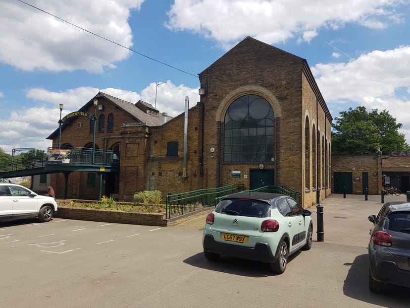 Markfield Adventure Playground hall: Industrial event venue space for weddings and parties.