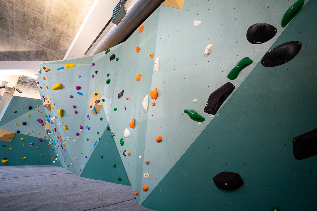 Vibrant indoor climbing wall for team-building events and active workshops.