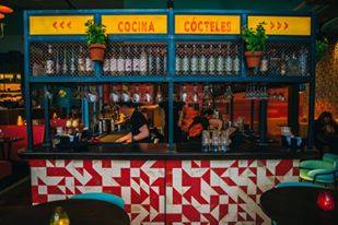 Vibrant bar area at Las Iguanas Bath, perfect for networking events and cocktail receptions. - Banner