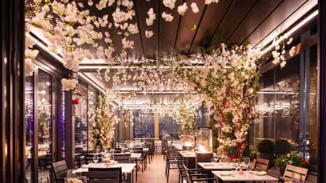 Floral-themed venue transformation at 90 Bar & Kitchen, ideal for corporate and social events.