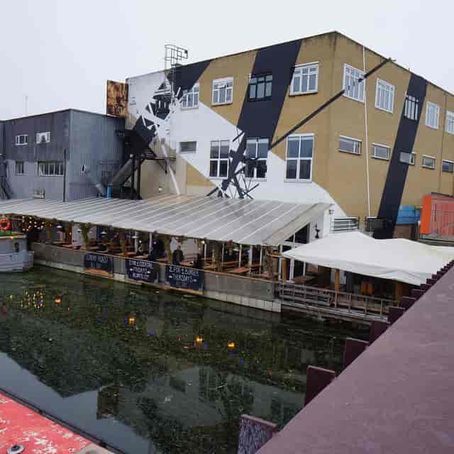 Industrial-chic waterside terrace at 90 Bar & Kitchen, ideal for edgy wedding reception venues.