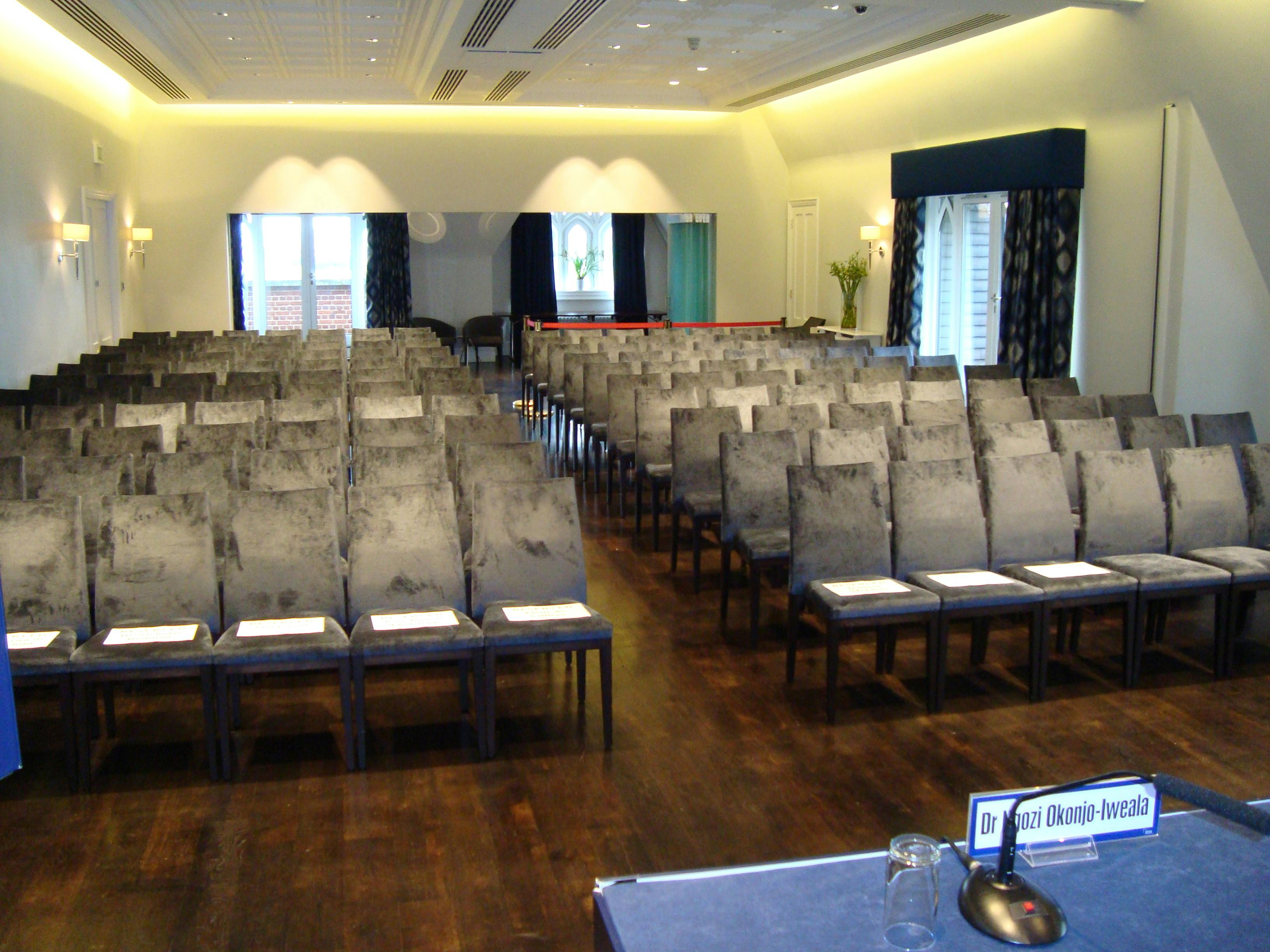 Lee Kuan Yew Room with arranged chairs for professional meetings and events.