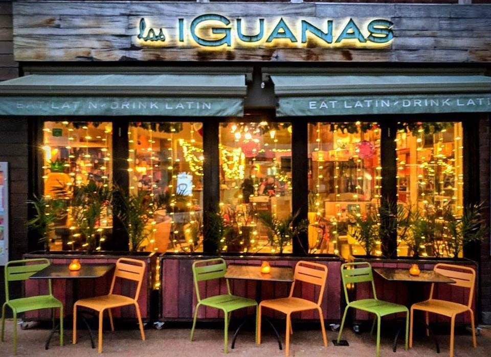 Vibrant Las Iguanas Leicester venue with colorful seating for casual gatherings and networking.