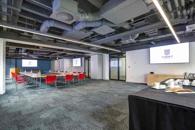 Modern meeting space, flexible seating, corporate event