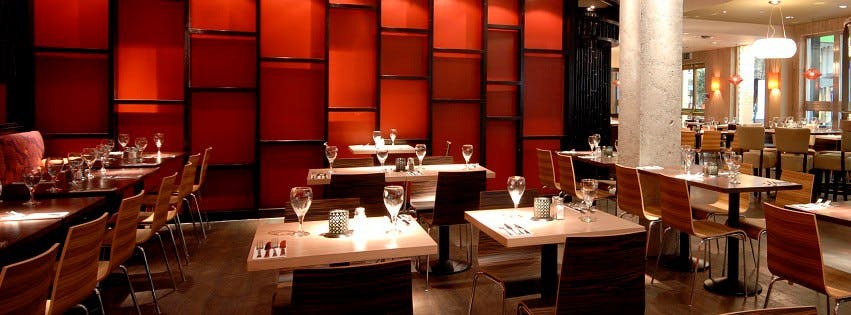Modern dining space at Las Iguanas London O2, perfect for networking events and private dinners.
