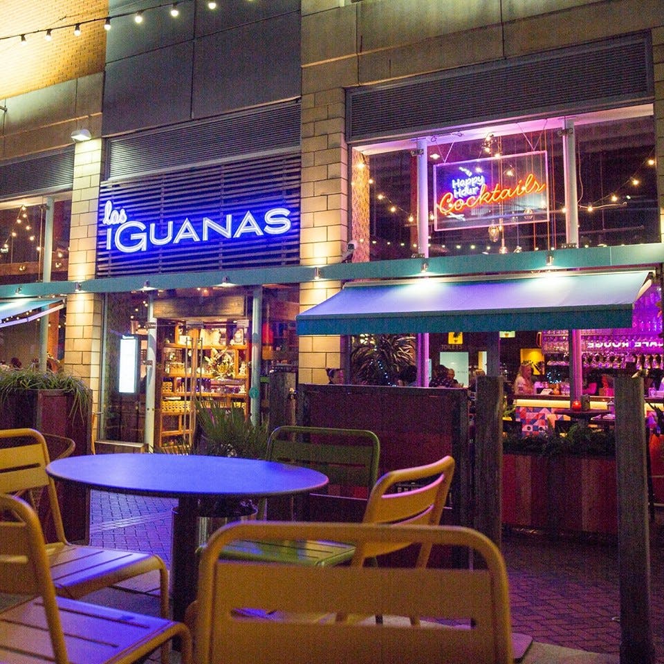 Vibrant Las Iguanas venue with colorful seating for casual gatherings and networking events.